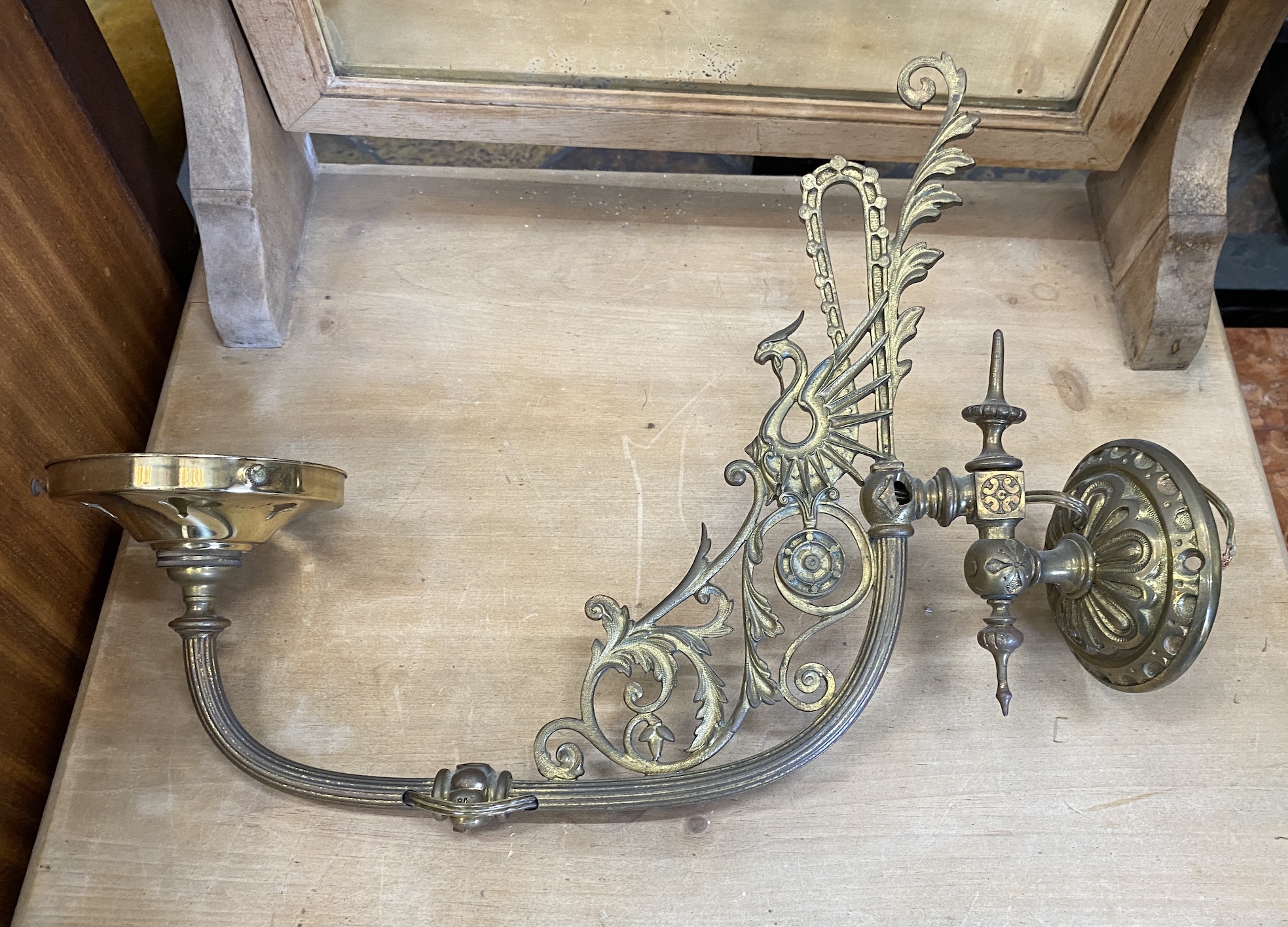 Two pairs of brass wall lights and one other, largest 60cm high